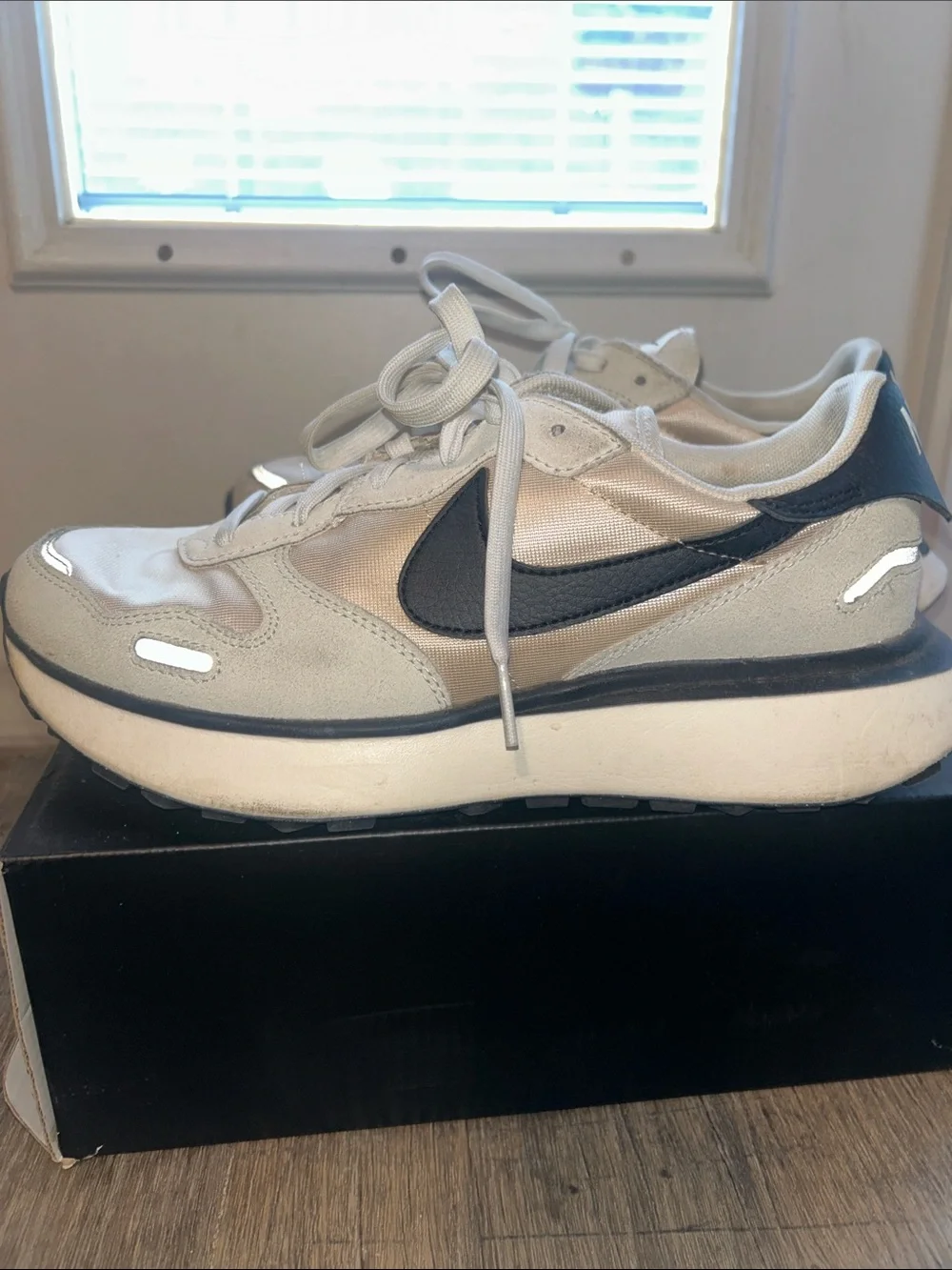 Women’s Nike Cream and Black Swoosh Platform Running Sneakers